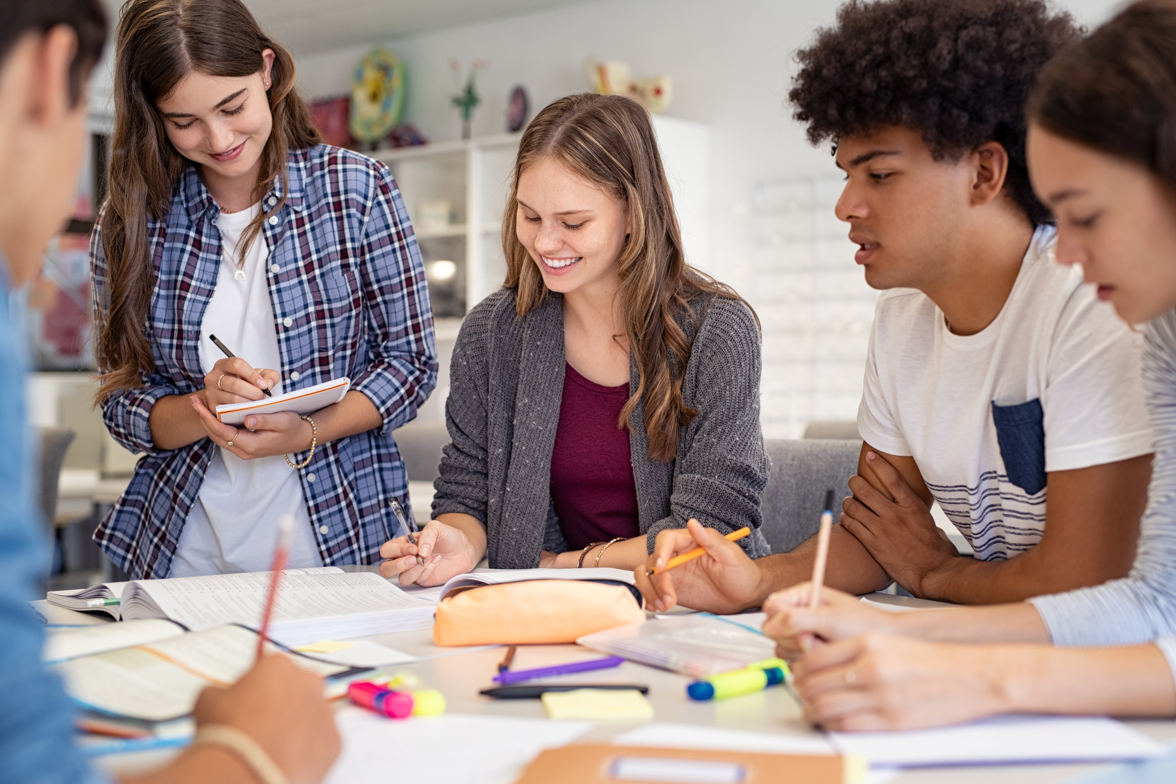 Group of college students studying together